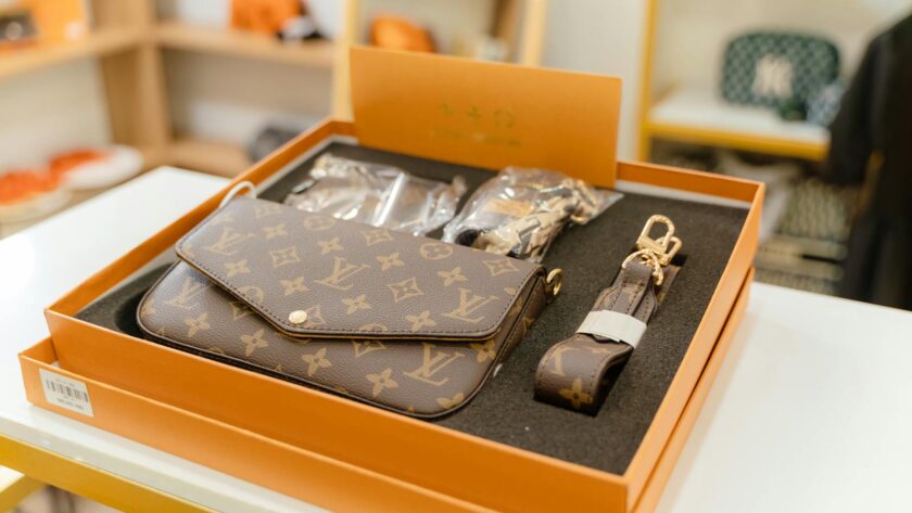 High-end Louis Vuitton monogram bag set displayed in a luxury boutique.