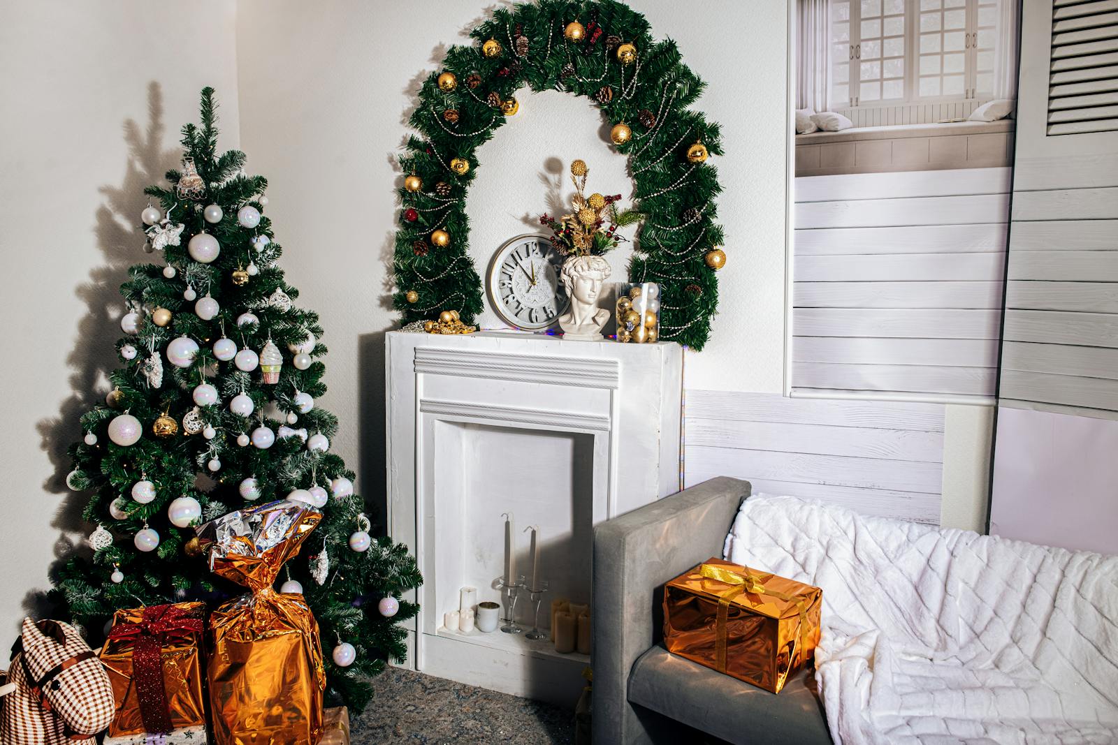 Cozy living room with a Christmas tree, gifts, and festive decor.